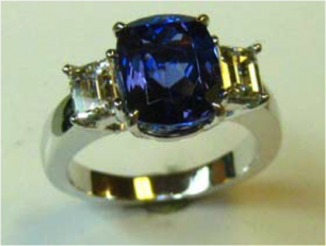 Item # 11 Tanzanite and diamond 3stone ring